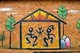 China: Dongba (Naxi) pictographic script adorns a house in the Old Town, Lijiang, Yunnan Province